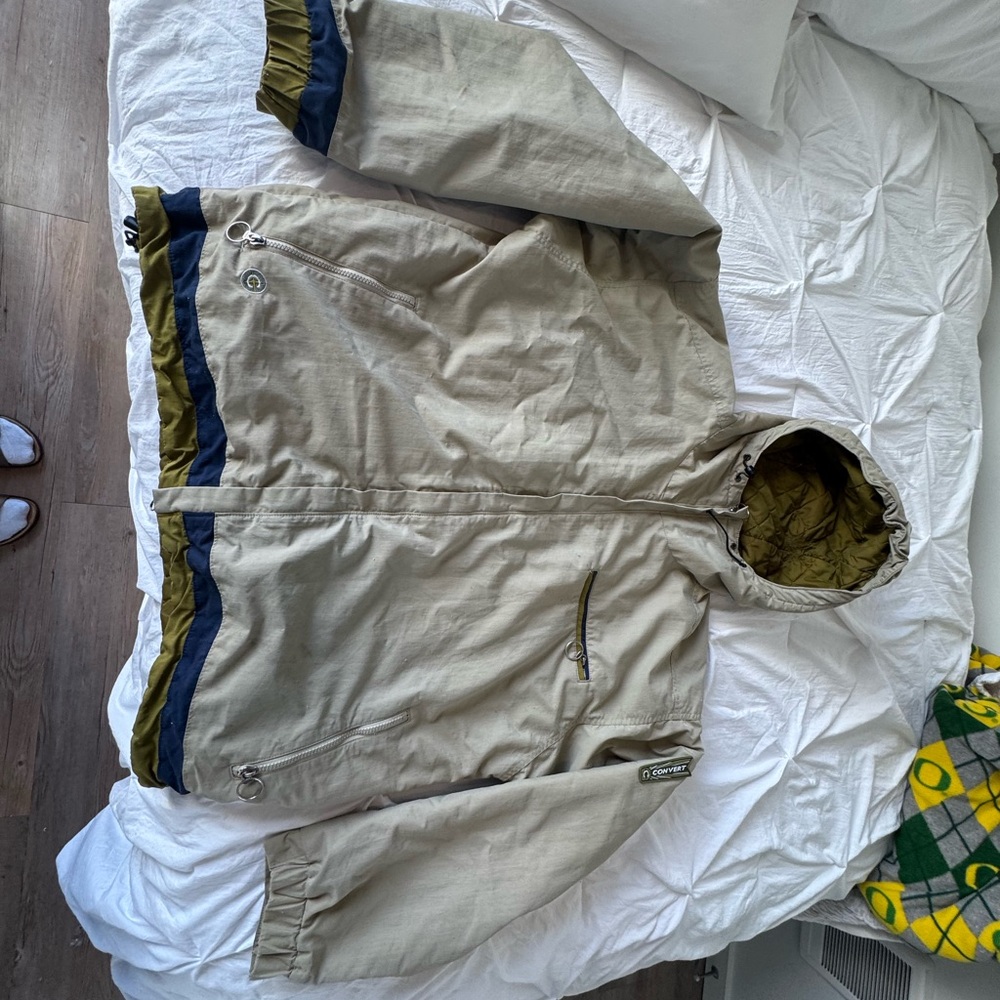 Beige Hooded Jacket with Blue and Green Accents